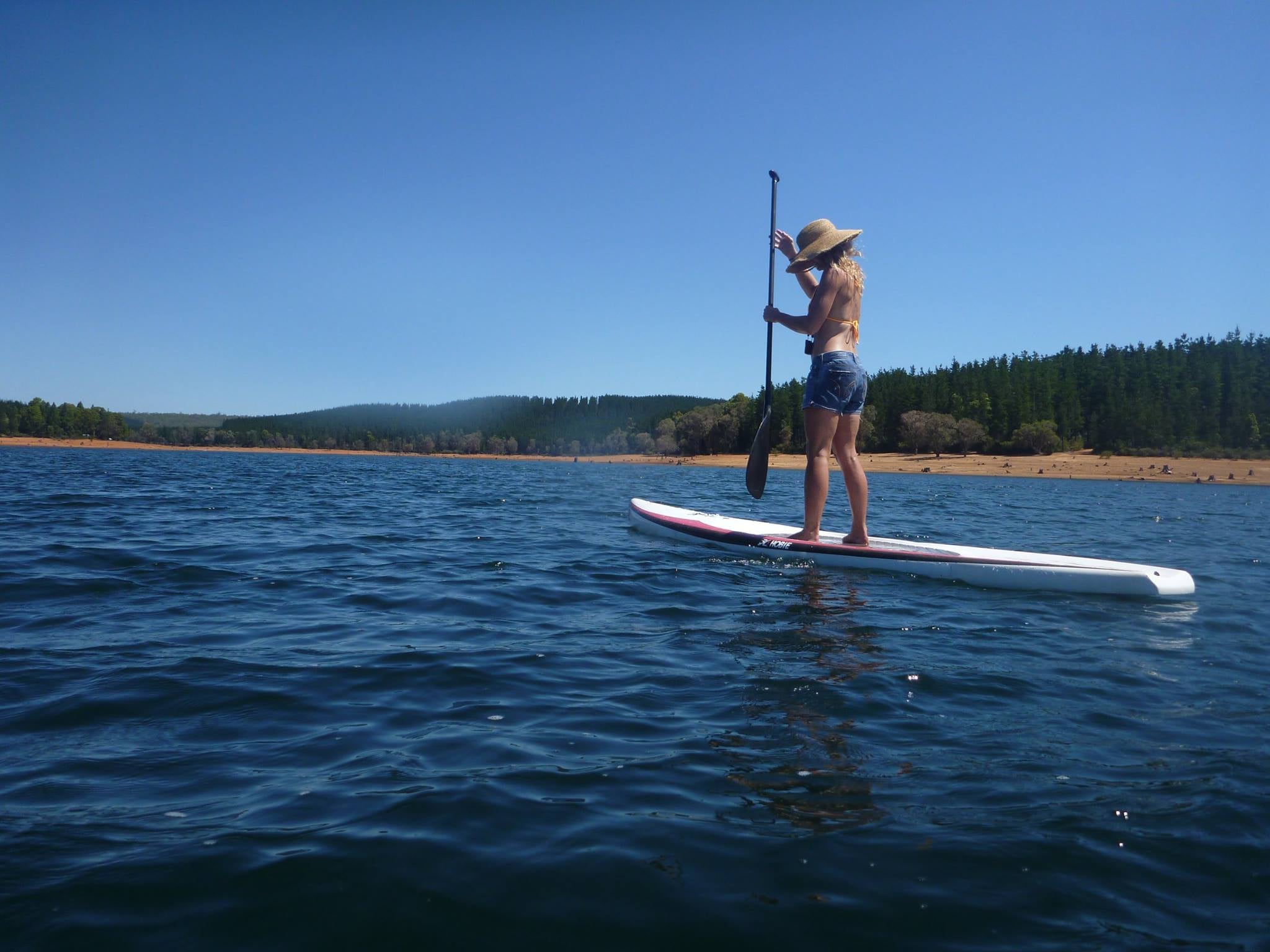 Maree from SUP TONIC standing on a pad